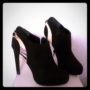 Black heeled booties.